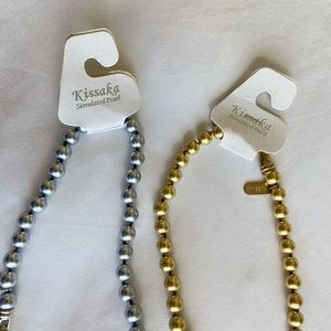 two pearl necklaces (simulated pearl)